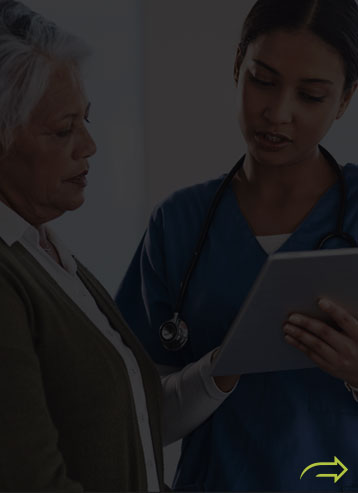 A healthcare professional assisting a patient
